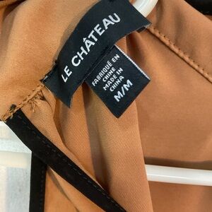 - Le Château 

Medium 
Mock Neck 
…Flattering fit.
Office/ evening A++